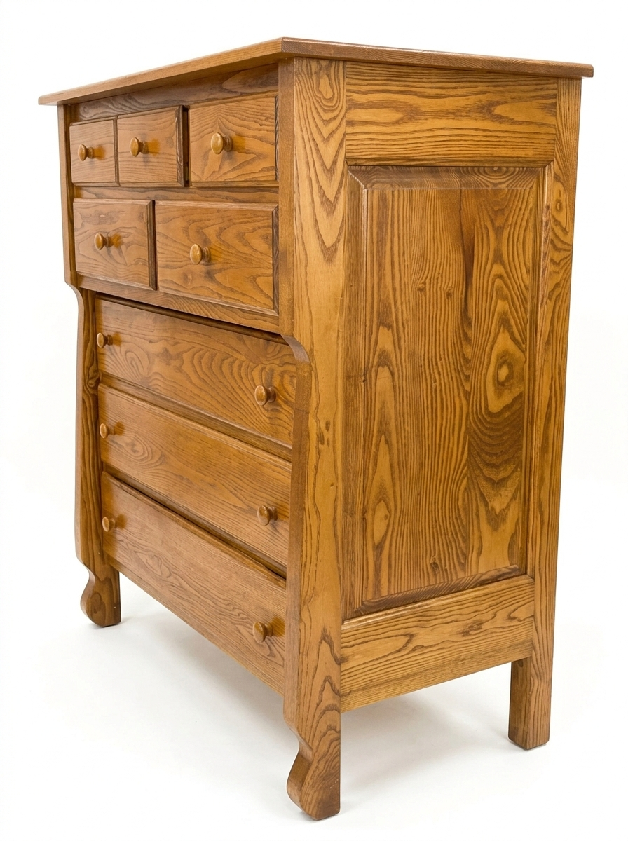 Compact oak dresser with seven drawers  - three-quarter angle showing wood grain detail